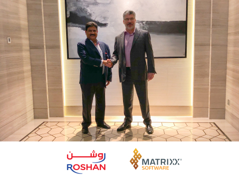Roshan CEO Karim Khoja and MATRIXX Software CEO Dave Labuda shake hands following the signing ceremony of their new partnership. (Photo: Business Wire)
