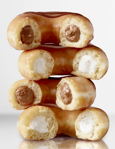 Landing June 17, NEW Original Filled Doughnuts will be permanently available in the U.S., initially in two flavors – Classic Kreme™ and Chocolate Kreme™. Try one for FREE June 22! (Photo: Business Wire)