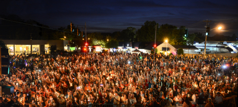 Tens of thousands of people attend the Elvis Week Candlelight Vigil every year. (Photo: Business Wire)