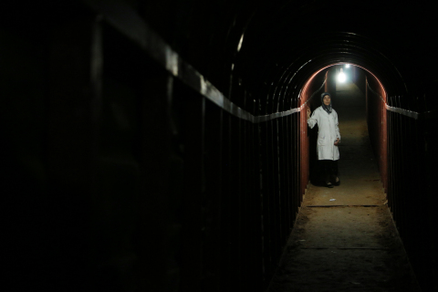 Ghouta, Syria - Dr. Amani in the underground tunnels. (Photo credit: National Geographic)