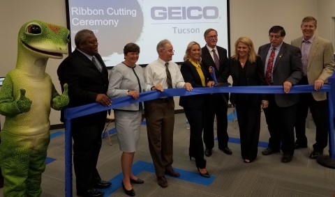 GEICO hosted a ribbon-cutting ceremony today to commemorate it's next chapter in Tucson. The company's team of 1,500 associates will relocate to its new office at The Bridges next month. Pictured from left to right are: The GEICO Gecko; Terry Perkins, GEICO assistant vice president; Nancy Pierce, GEICO senior vice president; Mayor Jonathan Rothschild; Michelle Trindade, GEICO regional vice president; Bill Roberts, GEICO president and CEO; Martha Furnas, GEICO regional vice president; Vice Mayor Richard Fimbres; Don Bourn, Bourn Companies Founder and CEO (Photo: Business Wire)