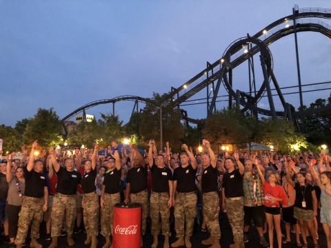 Members of the 135th Army band Aftershock toast America at Six Flags St. Louis during the annual Coca-Cola July 4th Fest. (Photo: Business Wire)