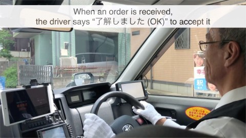 One Japanese taxi driver demonstrates the hands-free pickup feature. (Photo: Business Wire)