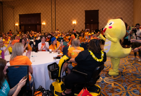 Teachers cheer as Dino, VIPKid’s mascot, enters the ballroom. Photo Credit: VIPKid/Grant Miller Photography