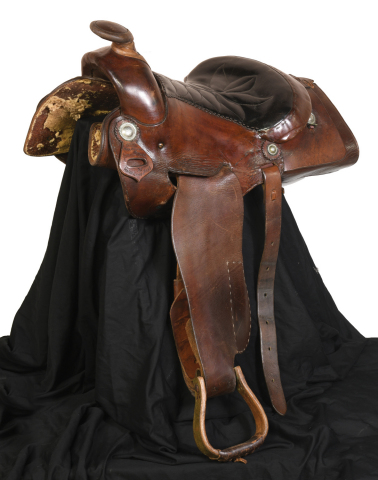 Lot 216. 1967 Elvis Presley’s Graceland Saddle Made by Mike McGregor $20-30,000 (Photo: Business Wire)