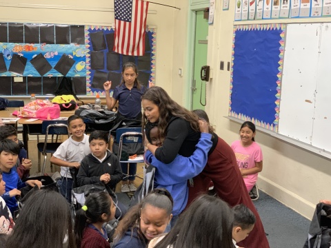Michelle Marquez connecting with a young listener (Photo: Business Wire)