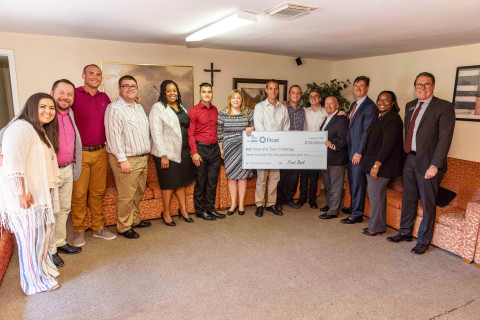 (L-R) Cesiah Colston of Adult and Teen Challenge; Jason Colston, Executive Director at Adult and Teen Challenge; unnamed resident; unnamed resident; Trisha Bradley of Frost Bank; unnamed resident; Donna Normandin of Frost Bank; three unnamed residents; Congressman Kevin Brady, R-TX; Greg Hettrick of the Federal Home Loan Bank of Dallas; Erika Jones of Frost Bank; and Eric Haar of the Federal Home Loan Bank of Dallas. (Photo: Business Wire)