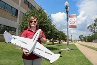 University of Louisiana Monroe UAS major Stephanie Robinson holds the Quantix drone, donated by AeroVironment to the school's Precision Agriculture and UAS Research Center. (Photo: The University of Louisiana, Monroe)