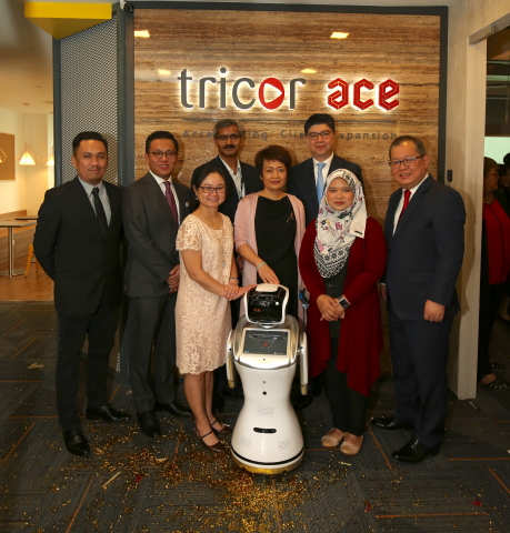 Caption of Photo attached: Unveiling of Tricor Group's new Shared Services Centre (SSC) named Tricor ace; Group CEO Lennard Yong (third from right), Group CFO & COO Wendy Wang (fourth from right), with special invited guests Pauline Goh, Director of Alliances, InvestKL (third from left) and Nik Izuddin Nik Mohd Yusof, Head of Global Business Services & Industry Development, MDEC (far left), Alia Sutarji, Lead Content & Solutioning, MDEC (second from right). Yeap Kok Leong, CEO & Managing Director Tricor Malaysia (far right), Joe Wan, CEO Tricor Hong Kong (second from left) and Prasad KNVS, Head of SSC (fourth from left) completes the group photograph. (Photo: Business Wire)