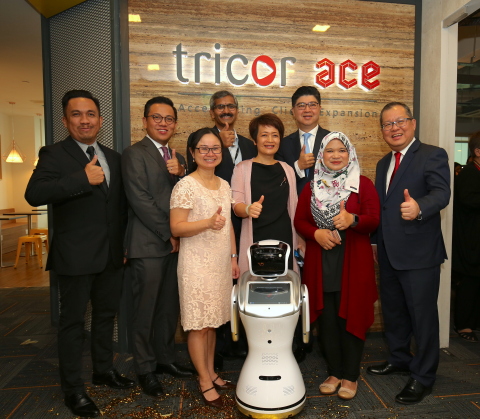 Caption of Photo attached: Unveiling of Tricor Group's new Shared Services Centre (SSC) named Tricor ace; Group CEO Lennard Yong (third from right), Group CFO & COO Wendy Wang (fourth from right), with special invited guests Pauline Goh, Director of Alliances, InvestKL (third from left) and Nik Izuddin Nik Mohd Yusof, Head of Global Business Services & Industry Development, MDEC (far left), Alia Sutarji, Lead Content & Solutioning, MDEC (second from right). Yeap Kok Leong, CEO & Managing Director Tricor Malaysia (far right), Joe Wan, CEO Tricor Hong Kong (second from left) and Prasad KNVS, Head of SSC (fourth from left) completes the group photograph. (Photo: Business Wire)