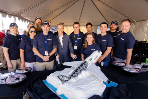 Airbus Americas Vice President of Procurement, Pierre-Laurent Mace (center), and members of the Hexcel Salt Lake City manufacturing team celebrate more than 40 years of the two companies collaborating and growing jobs in the U.S. (Photo: Business Wire)