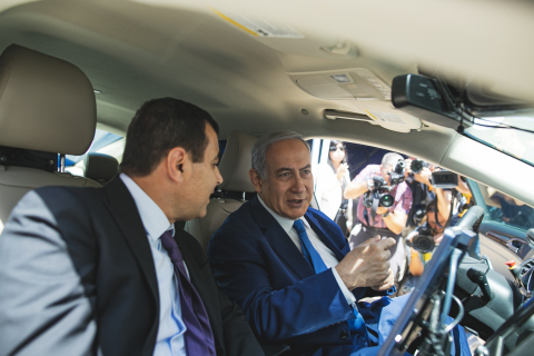 Intel Senior Vice President and Mobileye CEO Prof. Amnon Shashua (left) shows Israeli Prime Minister Benjamin Netanyahu the technology behind one of Mobileye's autonomous vehicles in Jerusalem on Tuesday, Aug. 27, 2019. Shashua and Netanyahu broke ground on Mobileye's new global development center at a cornerstone laying ceremony before getting behind the wheel. (Credit: Victor Levi/Mobileye)
