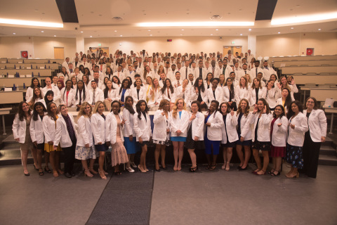 Incoming American University of the Caribbean School of Medicine students in their newly-received white coats. (Photo: Business Wire)