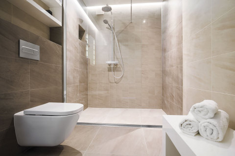 Affordable Tub-to-Shower Conversion Kits from QuickDrain USA can be easily customized to accommodate unexpected commercial plumbing and structural constraints. (Photo: Oatey)