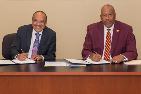 L-R: Dr. William F. Owen, RUSM dean and chancellor and Dr. Thomas Parham, CSUDH president (Photo: Business Wire)