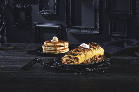 Available as part of the IHOP Addams Family menu, Gomez’s Green Chile Omelette is made with marinated pulled pork, jack & cheddar cheese, fire-roasted peppers & onions, and a green chile verde sauce topped with sour cream. (Photo: Business Wire)