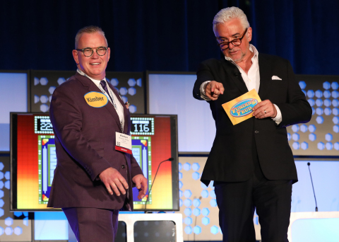 Incoming NAMB president Kimber White plays "Funding Feud" sponsored by Velocity Mortgage Capital and hosted by actor and television personality John O'Hurley. (Photo: Business Wire)