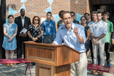 Congressional Candidate Michael Hiller speaking to a crowd in front of the Cortelyou Brooklyn Library (Photo: Business Wire)