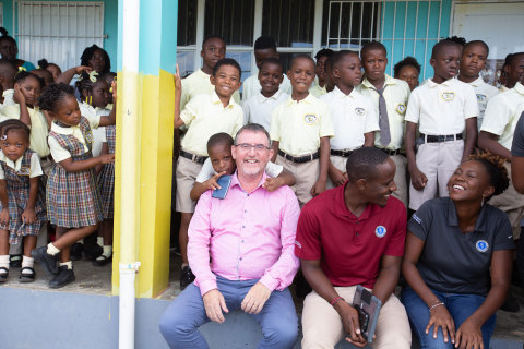 Dr. Sean Callanan, dean of Ross University School of Veterinary Medicine, meets with students at the Bronte Welsh Primary School in the Federation of St. Kitts and Nevis. (Photo: Business Wire)