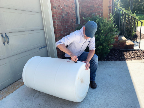 Install a spigot at the bottom of the barrel. This enables the collected rainwater to be used around the yard. (Photo: Exmark)