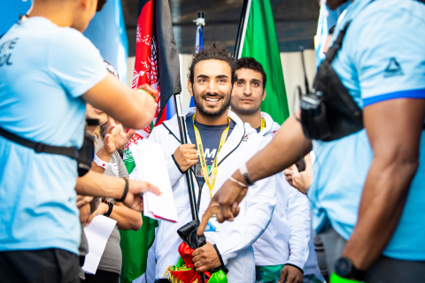 Afghanistan National Champion Sami Salampur smiles moments before taking the field at the opening ceremony at the 2019 Reebok CrossFit Games. (Photo: Michael Valentin / Business Wire)