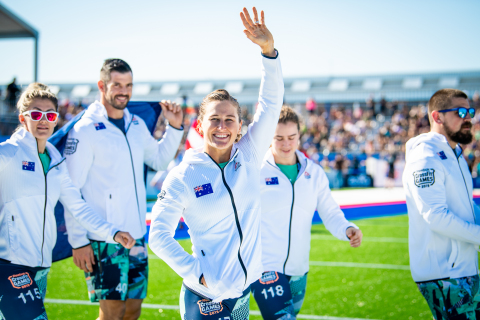 Tia-Clair Toomey, the three-time Fittest Woman on Earth and 2019 Australia National Champion, walks with her mates and waves to the crowd during the Opening Ceremonies at the CrossFit Games. (Photo: Michael Valentin / Business Wire)