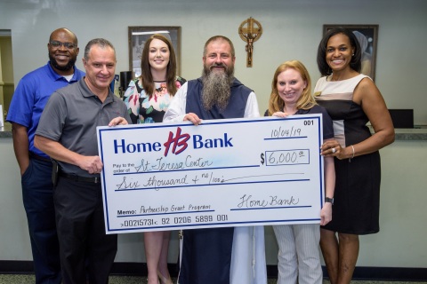 Home Bank and FHLB Dallas awarded $6K in Partnership Grant Program funds to St. Teresa for the Works of Mercy to benefit the organization's youth program. (Photo: Business Wire)
