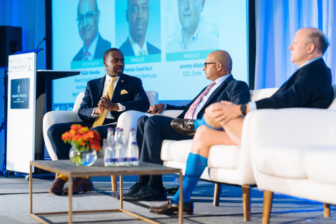 The keynote conversation between Bermuda Premier David Burt and Circle CEO Jeremy Allaire, moderated by Jessel Mendes, BDA Board Member and Partner at EY (Photo: Business Wire)