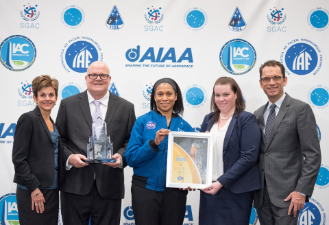 Sarah Willis, Victor Alfano, Emily Turner, and Bruce Burger accept NASA's Space Flight Awareness Award from Astronaut Jeanette Epps. (Photo: Business Wire)