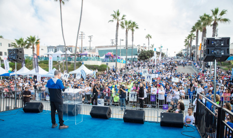 Skechers Pier to Pier Friendship Walk Co-Founder Michael Greenberg rallied thousands of walkers at the 11th annual event. The Walk broke donation records, raising over $2.2 million for children with special needs and education. (Photo: Business Wire)