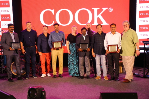 Cook Medical Leadership Team presents service awards to four employees who have been serving the company for 15 to 20 years. (Photo: Business Wire)