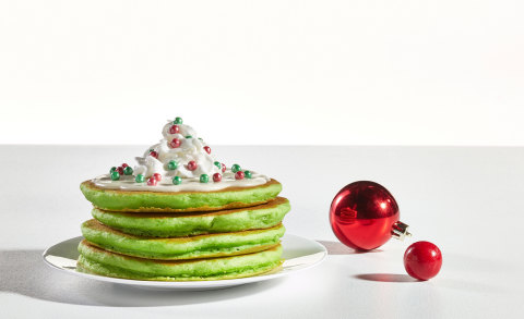 Guests of all ages will delight in ordering a stack (or two) of Jolly Cakes, fluffy green pancakes topped with sweet cream cheese icing, whipped topping and shimmery elf sprinkles that resemble elf-sized ornaments. (Photo: Business Wire)