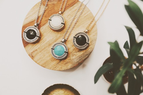 Featuring hand-cut resin accent stones and a highly discreet alert button — these demi-fine jewelry pendants offer the same dependable emergency services seniors have grown to trust — all with an upgraded appearance. (Photo: Business Wire)
