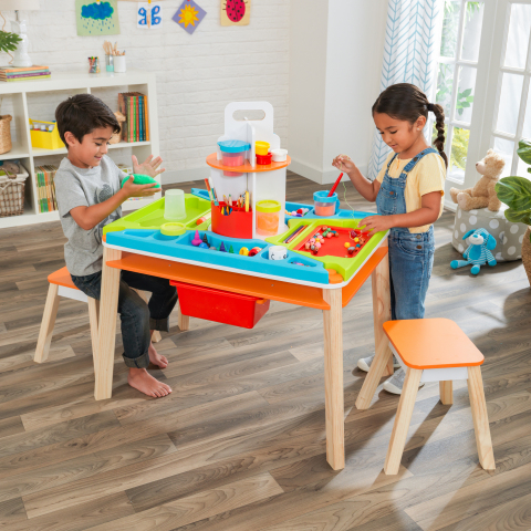 The Ultimate Creation Station from KidKraft - an innovative table set that contains smudges, smears, spots and stickies in one easy-to-access space. (Photo: Business Wire)