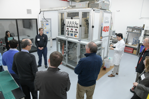 Henkel staff provided tours of the new Technical Center of Excellence focused on flexible packaging applications.  This investment included a laminator and retort chamber for flexible packaging development.  (Photo: Business Wire)