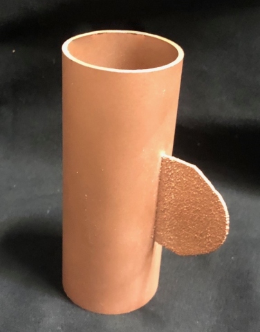 Pure Copper Fin Feature Added to Copper Tube. Photo courtesy of Optomec, Inc.