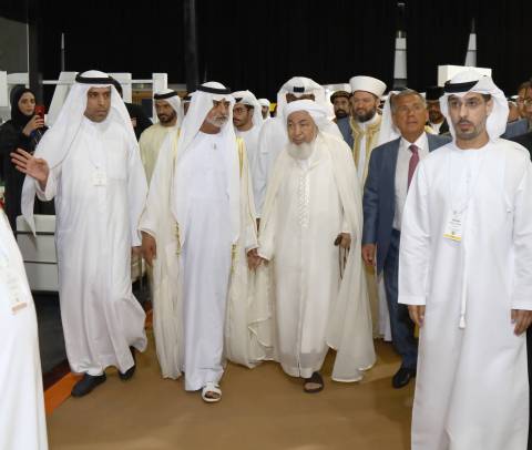 HE Sheikh Nahyan bin Mubarak Al Nahyan touring the WTS collocating exhibition, accompanied by Dawood Al Shezawi, Chairman of the Organizing Committee of the WTS (right) and HE Sheikh Abdulla bin Bayyah, Chairman of the UAE Fatwa Council, and HE Rustem Nurgalevich Menekhanov, President of the Republic of Tatarstan (left). (Photo : AETOSWire)