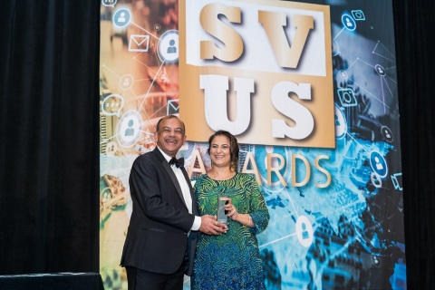 CEO Ragu Bhargava, left, and COO Gita Bhargava accept their awards onstage at the event in San Francisco. (Photo: Business Wire)