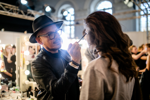 MBFW Russia, Luis Casco prepping runway model (Photo: Mary Kay Inc.)