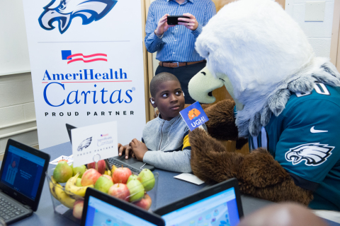 AmeriHealth Caritas, a national leader in Medicaid managed care, is partnering with the Philadelphia Eagles to launch the first in-classroom health and fitness learning modules associated with the National Football League (NFL). The modules, which will focus on health, nutrition and physical fitness for elementary and middle school-aged children, was introduced during a kick-off event at Add B. Anderson Elementary School in Philadelphia on December 19, 2019. (Photo: AmeriHealth Caritas)