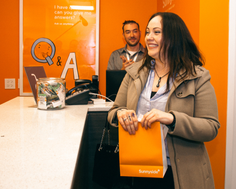 Sunnyside* Customer Jacqueline Ryan Makes the First Legal Purchase of Recreational Cannabis in Illinois at the Company's Lakeview Dispensary (Photo: Business Wire)