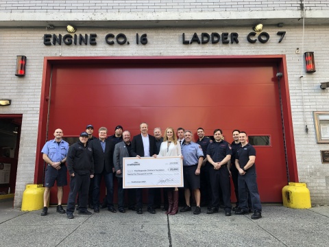 Cradlepoint CEO George Mulhern presents a check of $25,000 to the First Responders Children’s Foundation on January 15, 2020. (Photo: Business Wire)
