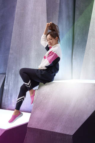 South Korean singer and actress Kim Sejeong wearing the new LiteRide Clog in Electric Pink. Sejeong is one of five global ambassadors announced as part of Crocs' newest "Come As You Are" campaign, inspiring fans to feel comfortable in their own shoes. (Photo: Business Wire)