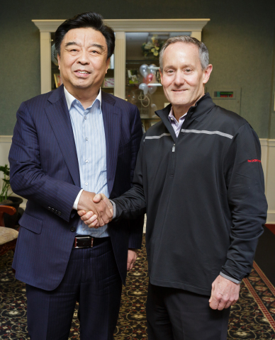 Pictured: Shandong Ruyi Chairman, Yafu Qiu and The LYCRA Company CEO, Dave Trerotola (Photo: Business Wire)