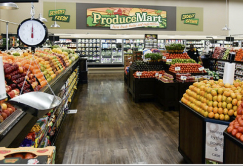 The expanded produce section of the new Hanford Smart & Final Extra! store offers an assortment of club and traditional-sized fresh and organic options. (Photo: Business Wire)