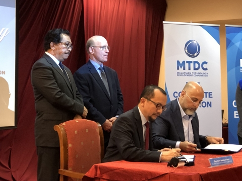 MTDC and WLC execute MoU to deploy Digital Economy Platform with world’s leading technology firms digitizing Malaysia and its trade partners. (Photo: Business Wire)