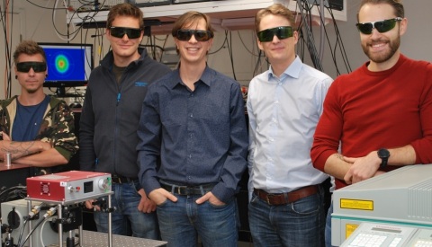 Researchers from Lund University developed an imaging method that provides an unprecedented view of sprays such as the ones used for liquid fuel combustion. Pictured (from the left) are PhD student Kristoffer Svendsen, postdoctoral researcher Diego Guénot, group leader at the Division of Combustion Physics Edouard Berrocal, group leader at the Division of Atomic Physics Olle Lundh and PhD student Jonas Björklund Svensson. Credit: Edouard Berrocal, Lund University