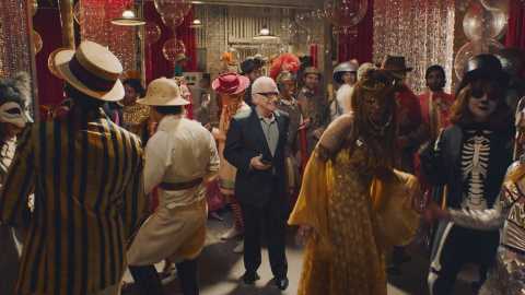 Martin Scorsese stands alone in the middle of a costume party, sans a costume anxiously awaiting an answer from Jonah Hill - will he "show up?"  (Photo: Business Wire)