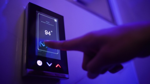 A guest uses a touch pad to set the shower temperature at The Sinclair hotel. Intel and The Sinclair, Autograph Collection, in Fort Worth, Texas, announced in February 2020 a collaboration to deliver a next-generation connected guest experience. (Credit: Sinclair Holdings LLC)