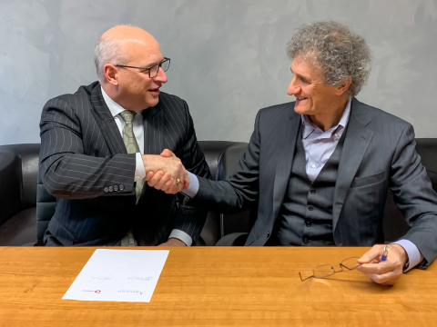 Ascend Performance Materials CEO Phil McDivitt and D'Ottavio Group president Giancarlo D'Ottavio signing an agreement for the purchase of Poliblend and Esseti Plast GD. (Photo: Business Wire)